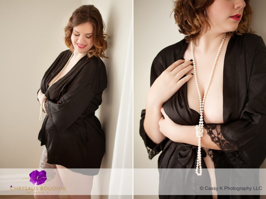 Curly brunette becoming confident black silk robe pearls for Boudoir Photoshoot