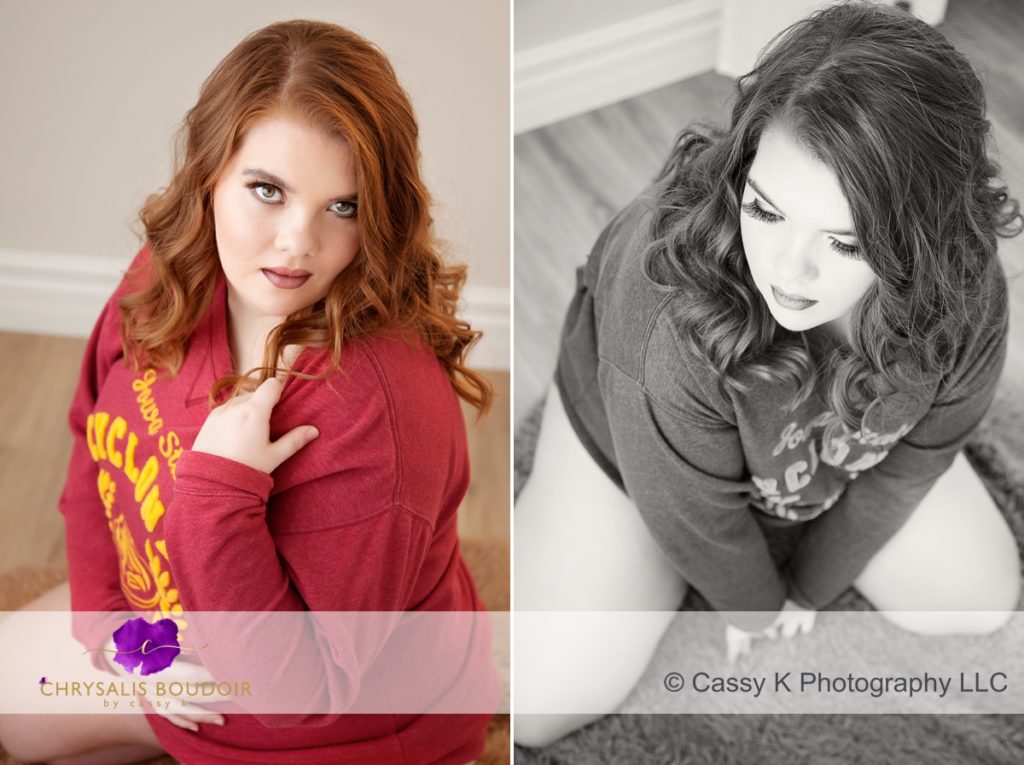 Curly Red Head kneeling and wearing Red Cyclones Sweatshirt for Boudoir Photoshoot helps Surviving Abuse
