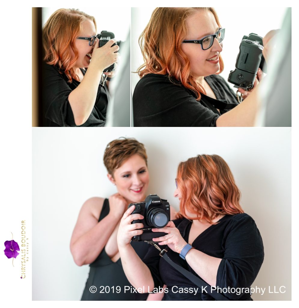 natural light boudoir photographer working with client in black low cut dress