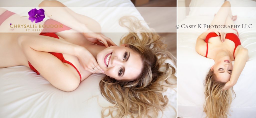 Long Blonde hair brown eyes giving gift he can’t buy wearing red bra on white sheet playful and sexy for Boudoir Photoshoot