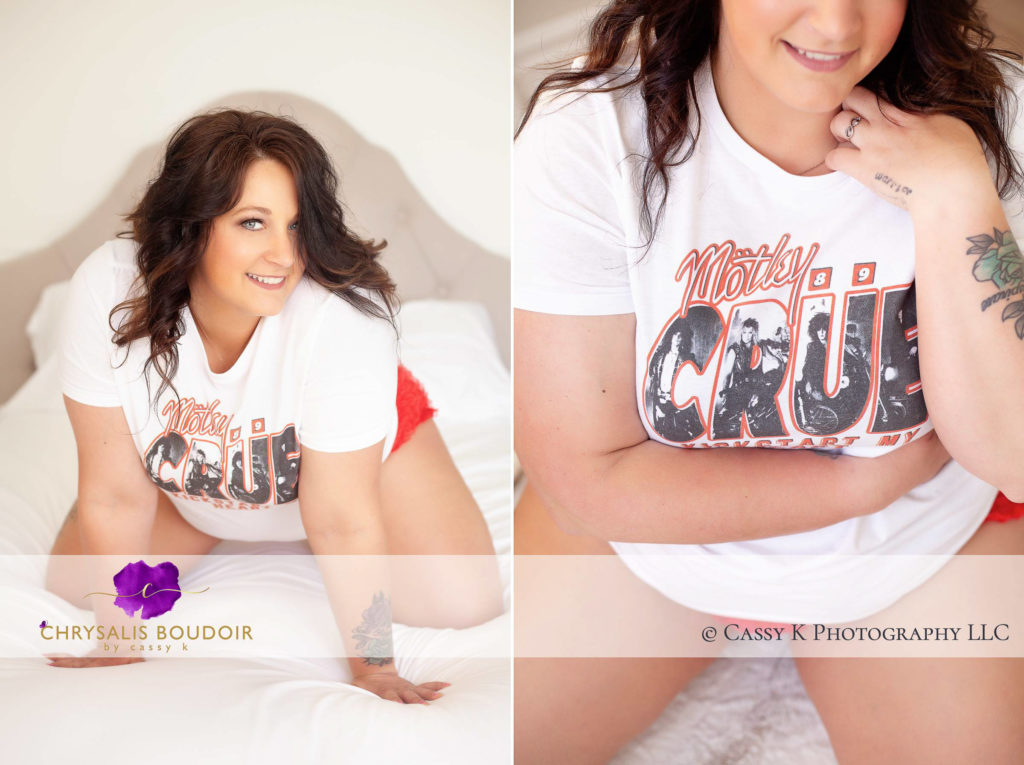 Brunette and blue eyed woman empowered in Motley Crue shirt for Boudoir Photoshoot