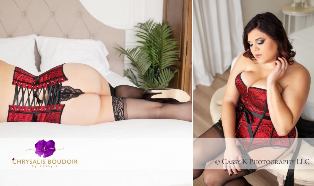 Brunette hair and blue eyed tomboy wearing red and black lace corset on bed for Boudoir Photoshoot