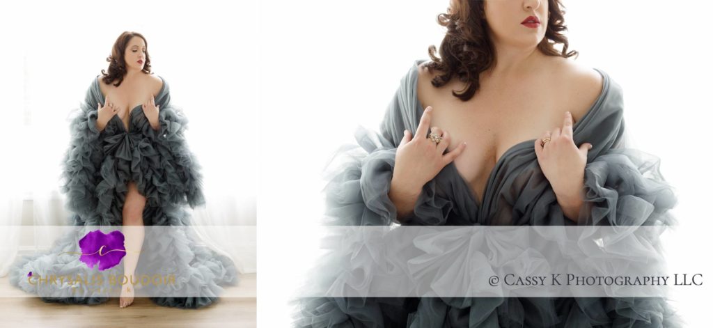 Brunette woman wearing couture gown in boudoir session