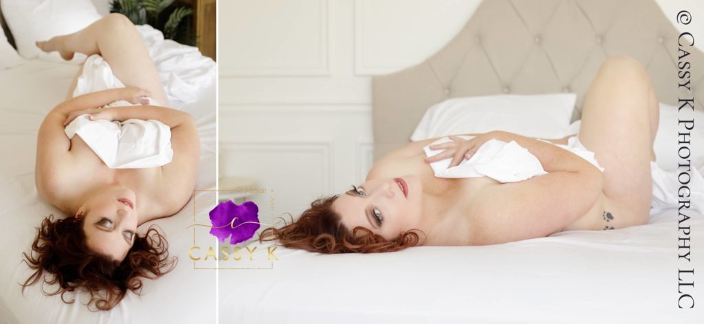 Red haired and blue eyed woman claims she's not photogenic during white sheet Boudoir Photoshoot