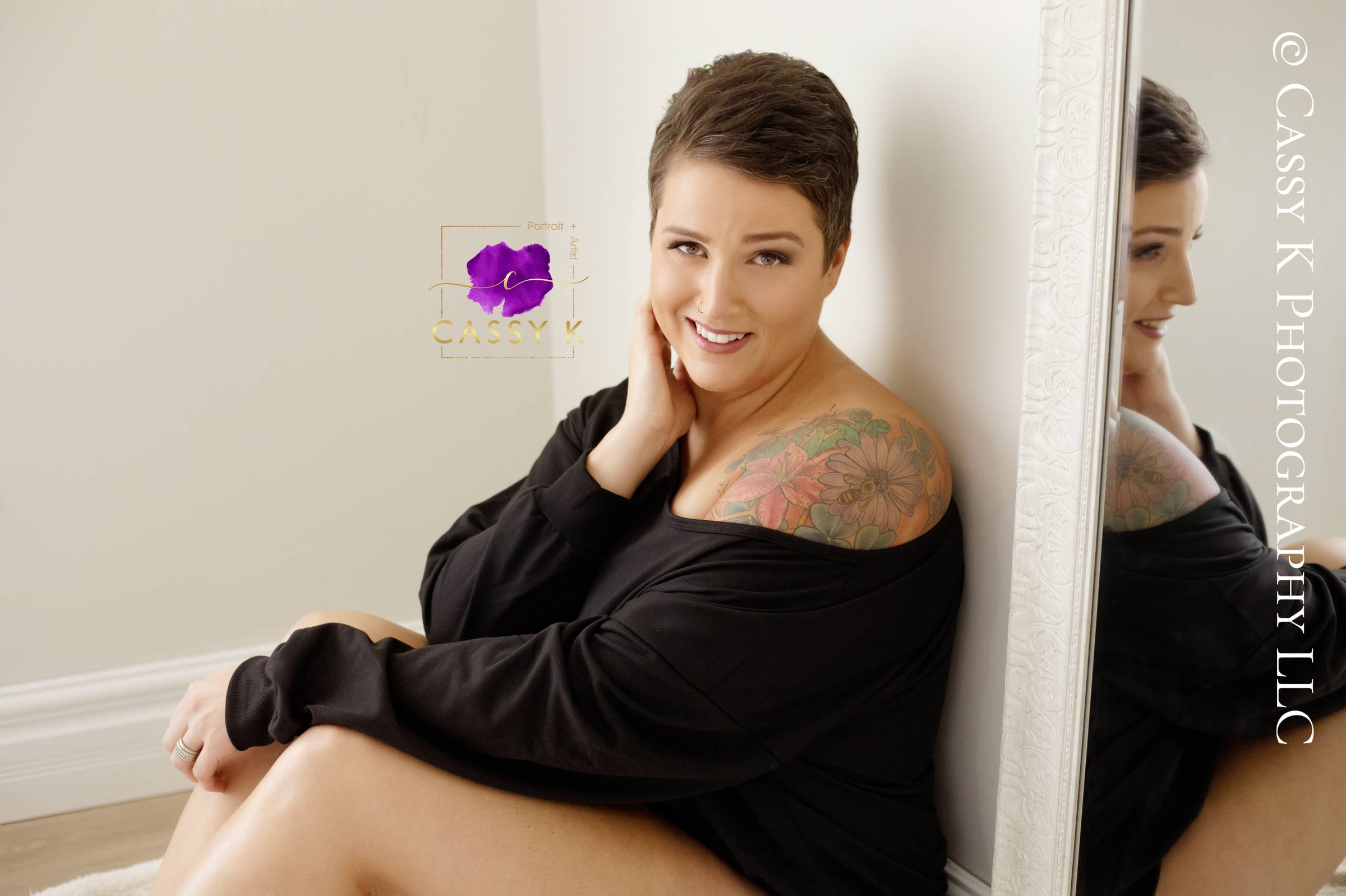 Brunette, blue eyed woman gains confidence boost during sweater Boudoir Photoshoot