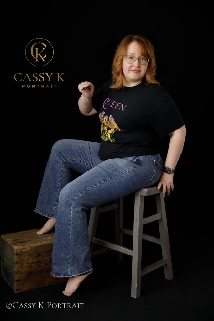 Goofy Blond hair and blue green eyed woman learns to love body image after 40 for headshot photo shoot
