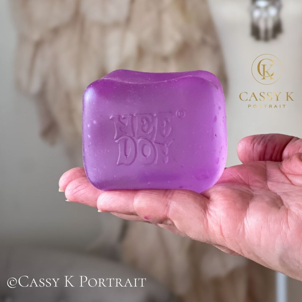 Cassy boudoir photographer of Cassy K Portrait talks about her how she uses a needoh nice cube for anxiety